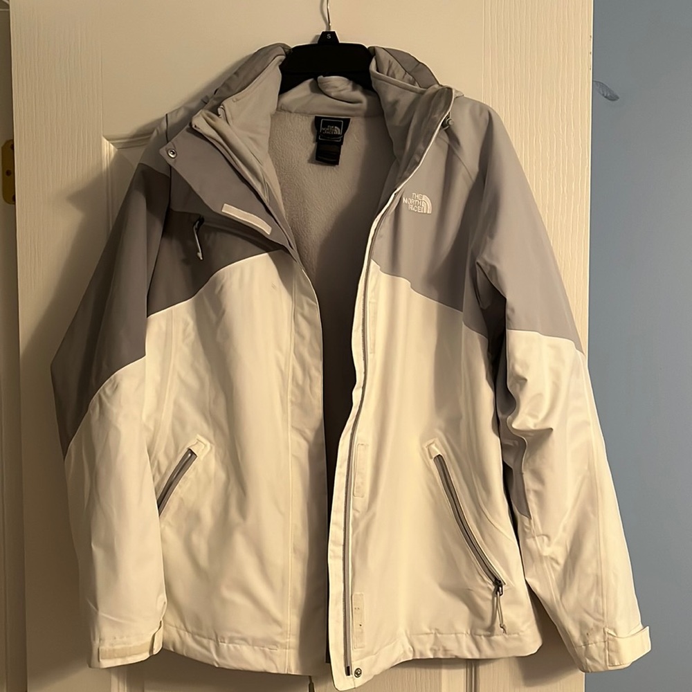 Medium North Face fleece-lined winter coat with waterproof top layer